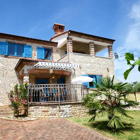 The House With Blue Windows *